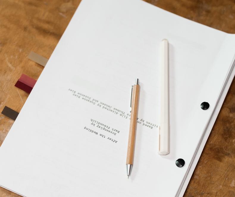 Movie script with writing materials