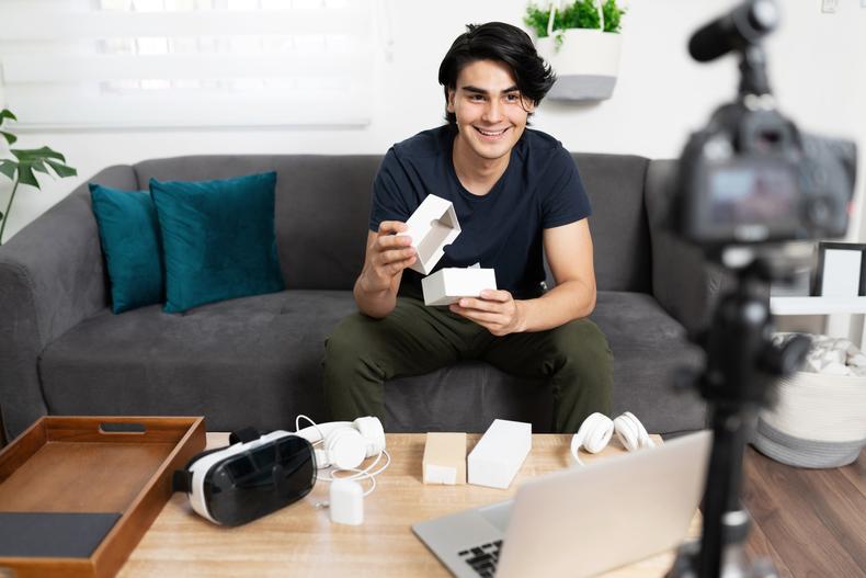 Man recording an unboxing video