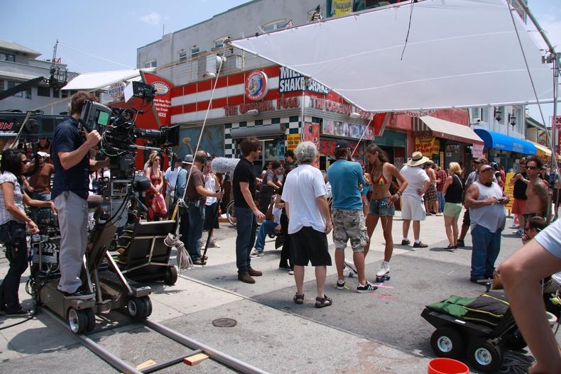 Crowded outdoor film set