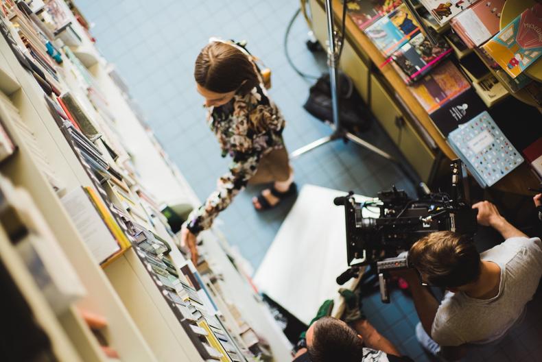 Filming a scene in a library