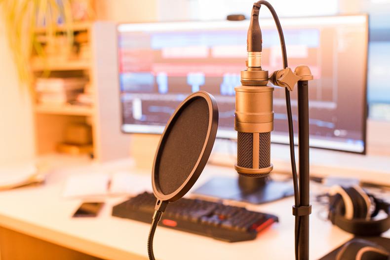 Microphone with pop filter in a home studio