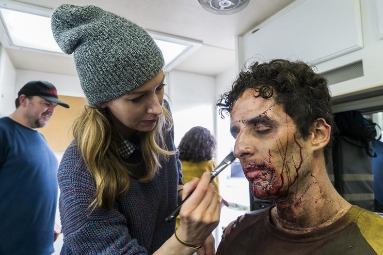 Makeup artist working with an actor