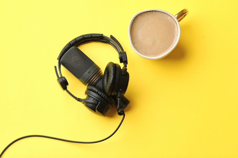 Headphones, mic, and a cup of coffee