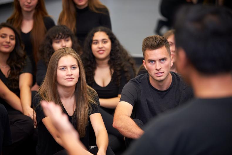 Group of acting students in class