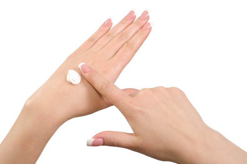 Applying lotion to hands