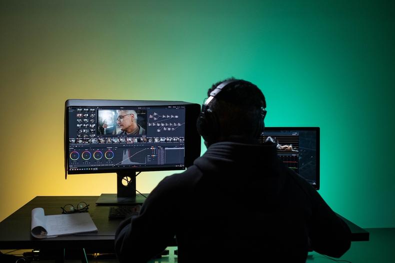 Video editor at a workstation