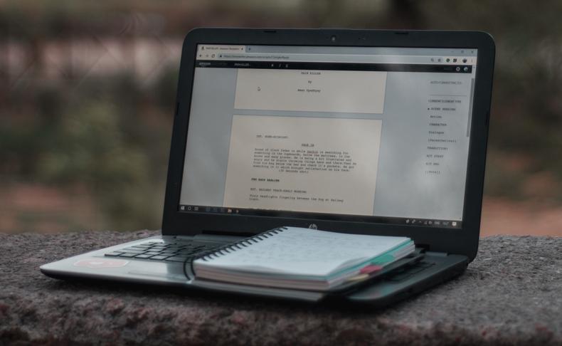Movie script displayed on a laptop