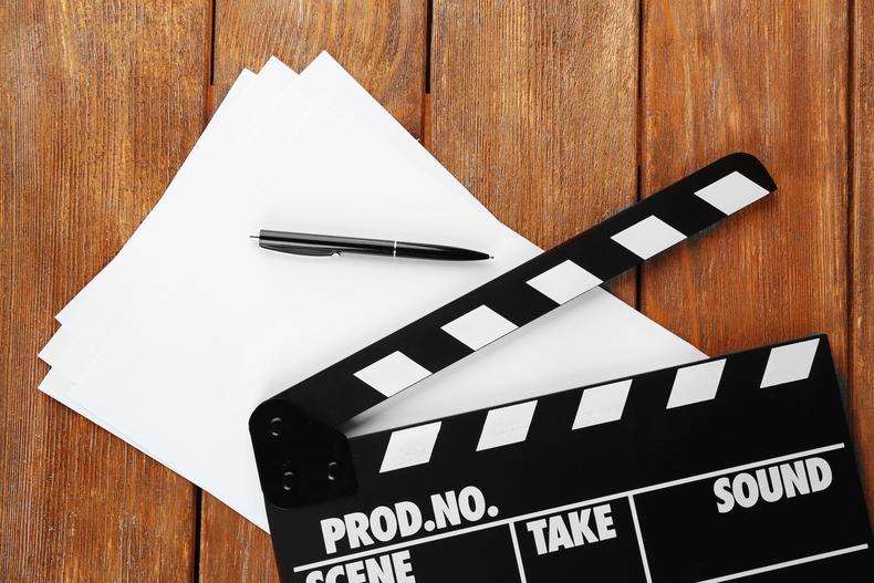 Clapperboard and blank pages