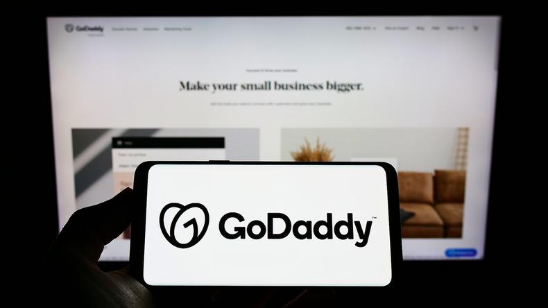 GoDaddy logo displayed on a phone