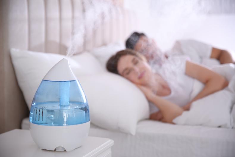 Humidifier near a sleeping couple
