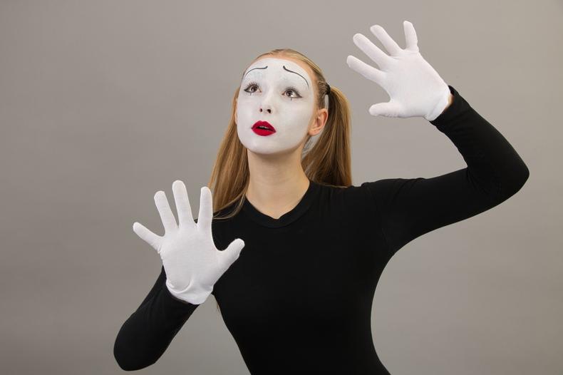 Child actor dressed as a mime