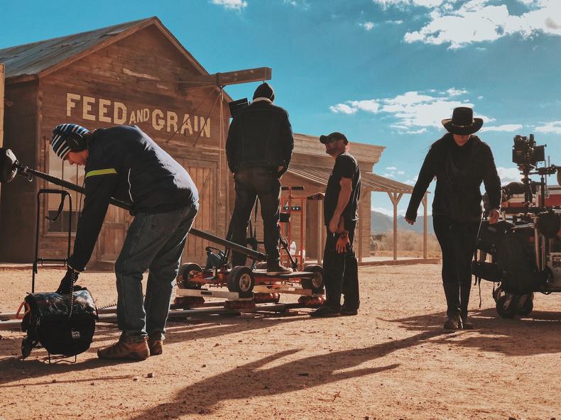 Crew on a Western-style film set