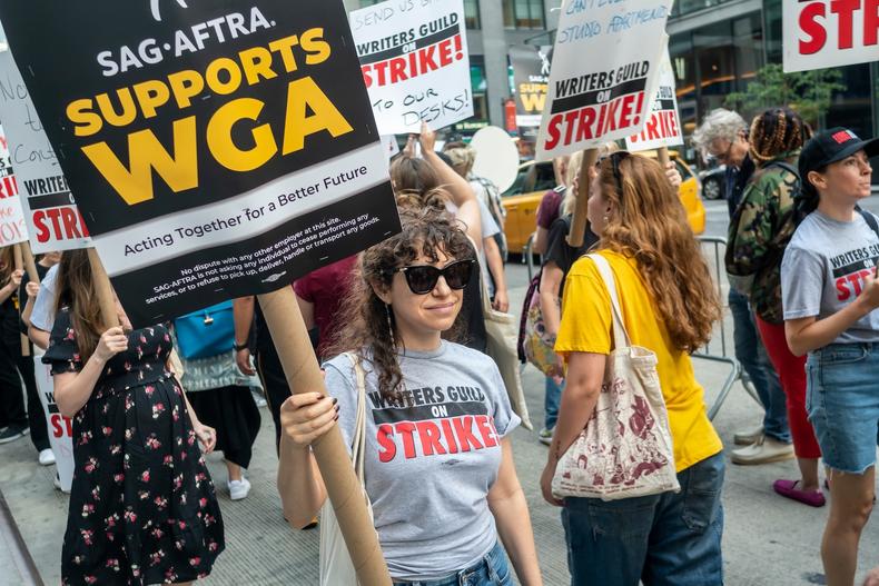 SAG-AFTRA supports WGA strike picket sign