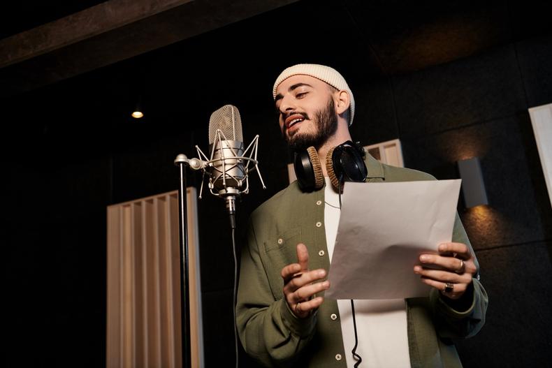 vocalist in the recording booth